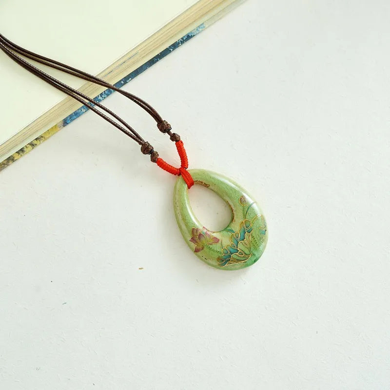 Elara floral green pendant necklace