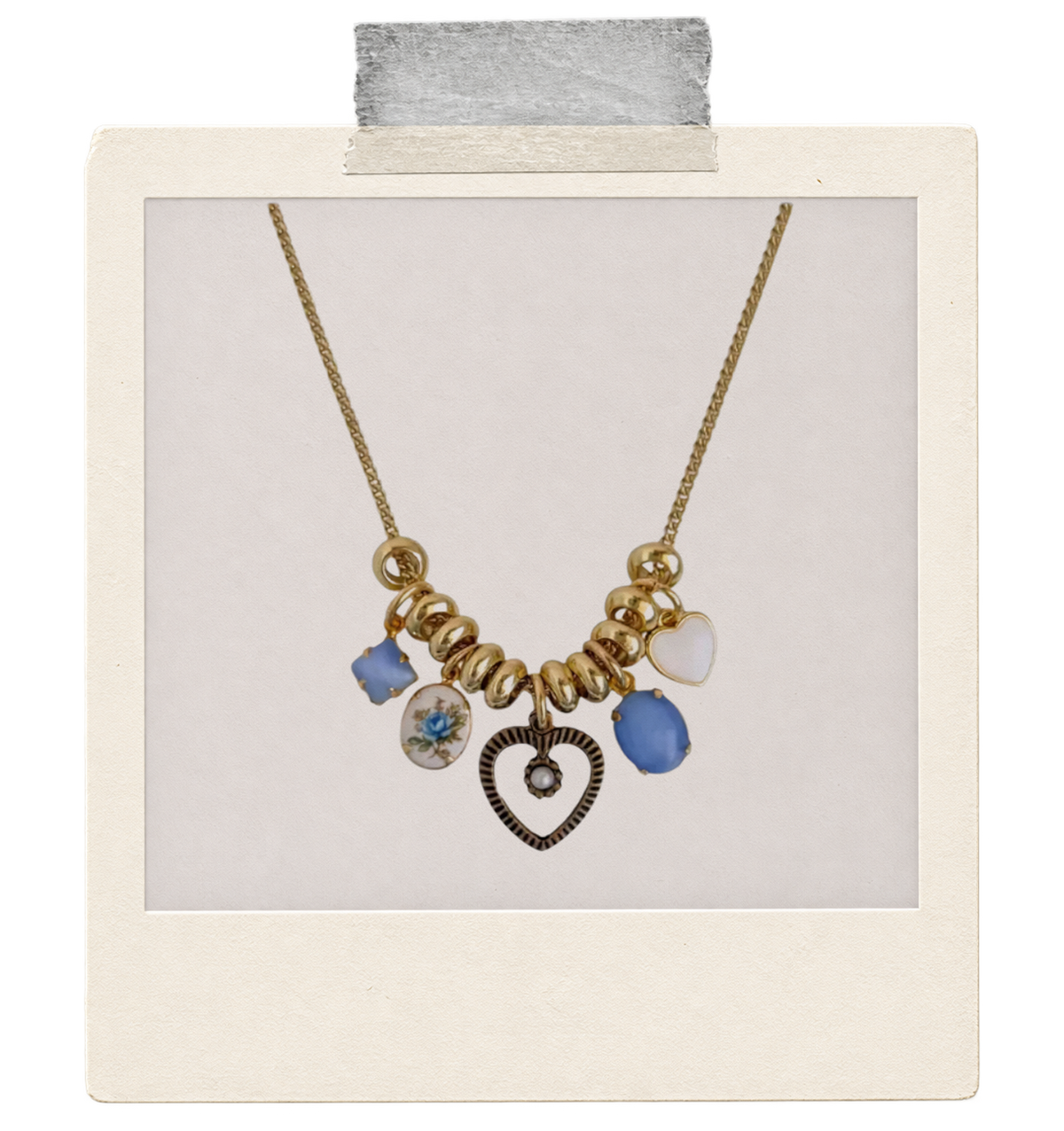 Blue Crush Blue Heart Cluster Charm Necklace — open dark heart centre